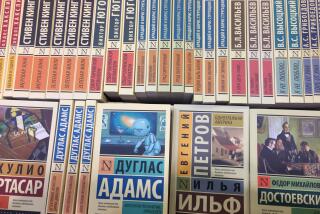 Russian and international classics are standing in a bookshelf of a stand at the international book fair in Moscow, Russia, 06 September 2017. Blue in the middle: Douglas Adams, The Hitchhiker's Guide to the Galaxy; to the right Ilja Ilf/Yevgeni Petrov, One-storied America and Fyodor Dostoyevsky, The Brothers Karamazov. Circa 600 publishers from 39 countries participate in the largest book fair in Russia and the former Soviet Union, which is on until 10 September 2017. Photo: Friedemann Kohler/dpa (Photo by Friedemann Kohler/picture alliance via Getty Images)