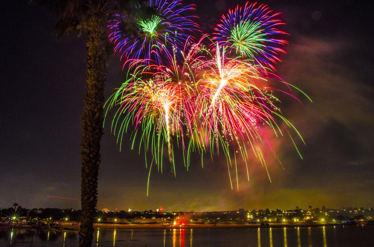 Fireworks burst over Back Bay in Newport Beach.