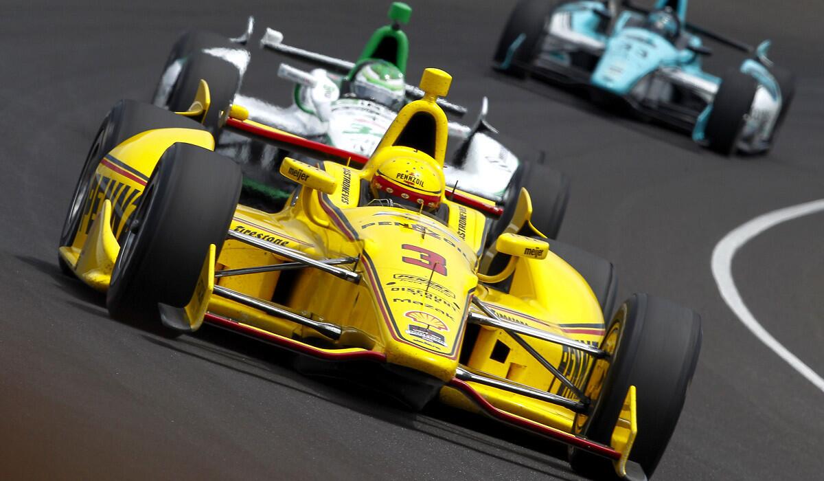 IndyCar driver Helio Castroneves, who will start from the second position in the Indy 500, takes a turn at Indianapolis Motor Speedway in his No. 3 Pennzoil Team Penske Chevrolet Dallara during practice Monday.