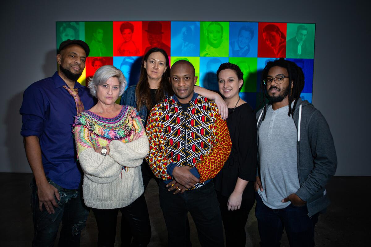 Artist Hank Willis Thomas, center, with members of his studio and gallerists from Kayne Griffin Corcoran. From left: Coby Kennedy, Sarah Watson, Maggie Kayne, Helen Banach and Will Sylvester.