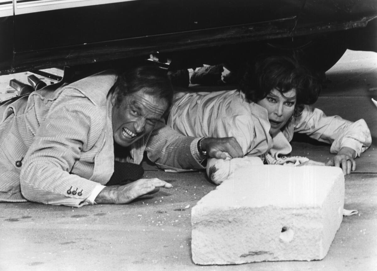 Charlton Heston and Ava Gardner in "Earthquake."