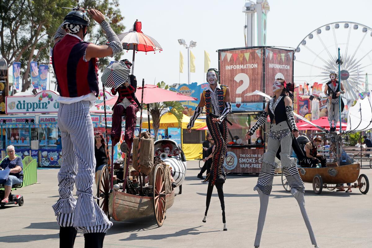 Members of the Dragon Knights perform Friday on opening day of the O.C. Fair in Costa Mesa.