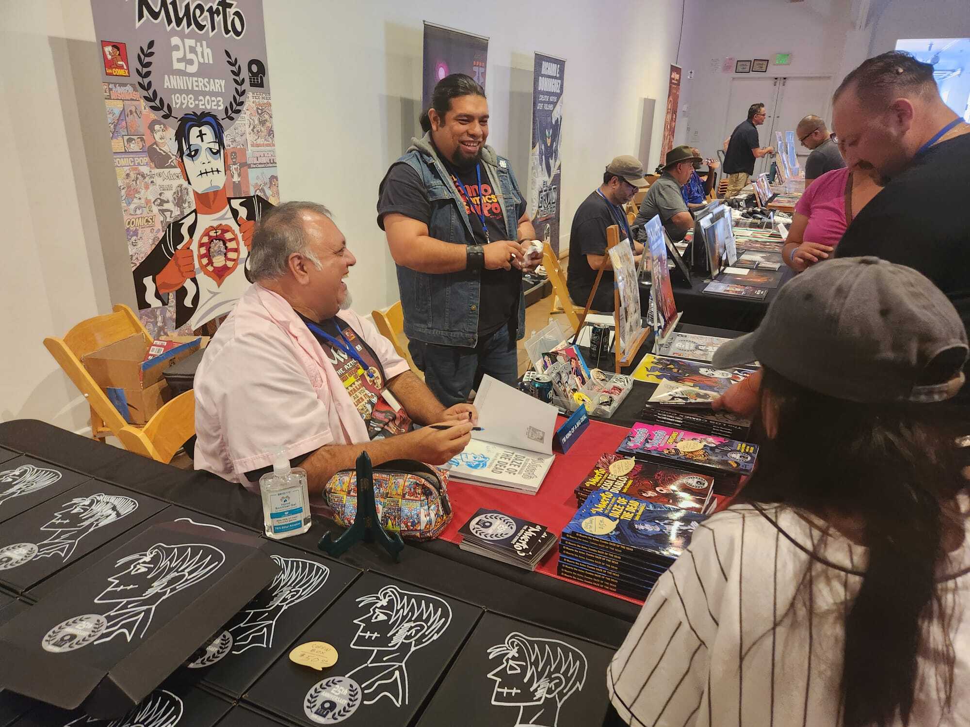 Two men at a booth