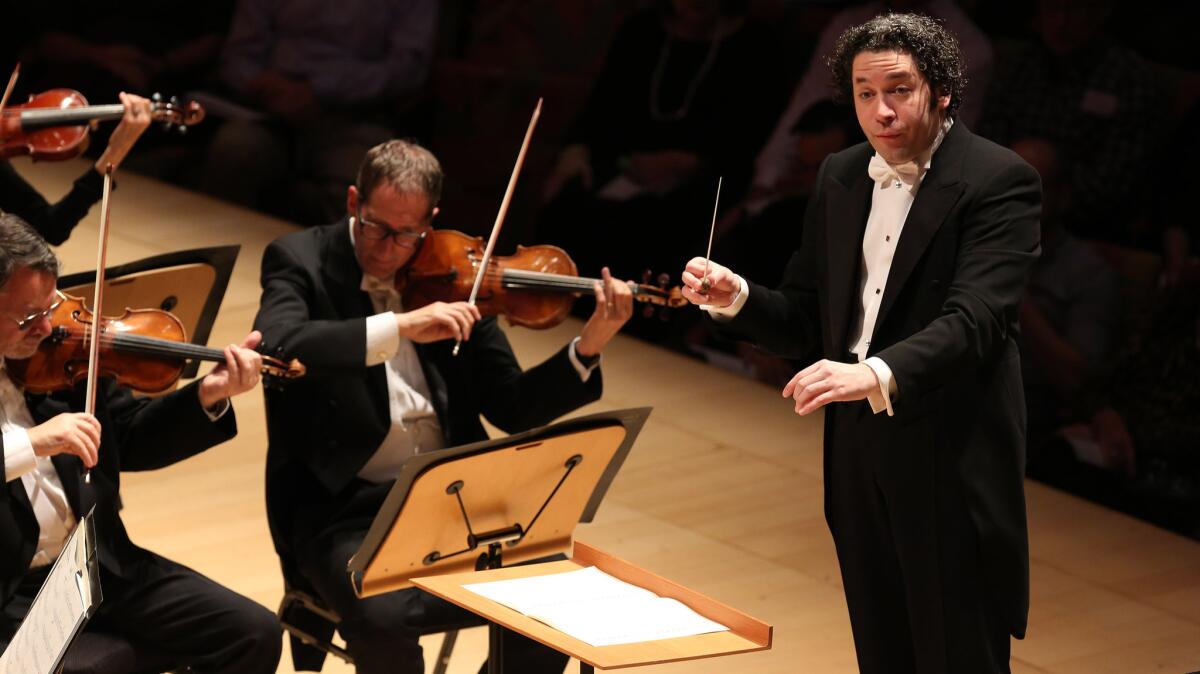 Gustavo Dudamel, pictured Thursday during the Mozart & Pärt mini-festival. On Saturday afternoon, the conductor led the Los Angeles Philharmonic through two Mozart symphonies and the premiere of an Arvo Pärt arrangement of a 1988 piece for a cappella chorus.