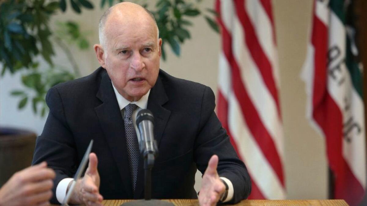 Gov. Jerry Brown speaks during a news conference at his office in Sacramento on Nov. 7.