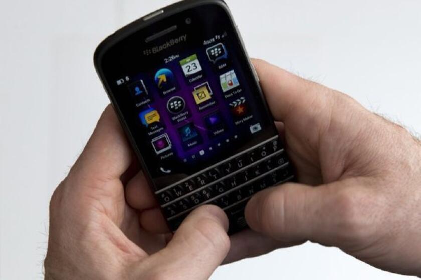 A BlackBerry device with a keyboard.