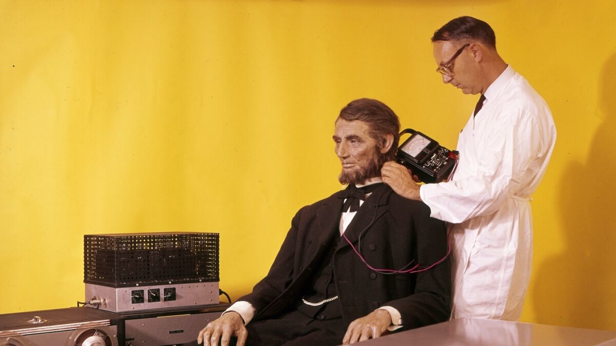 Checking the electronic health of a robot Mr. Lincoln is part of "The Imagineering Story," a new documentary series on the making of Disney theme parks streaming from Disney+.