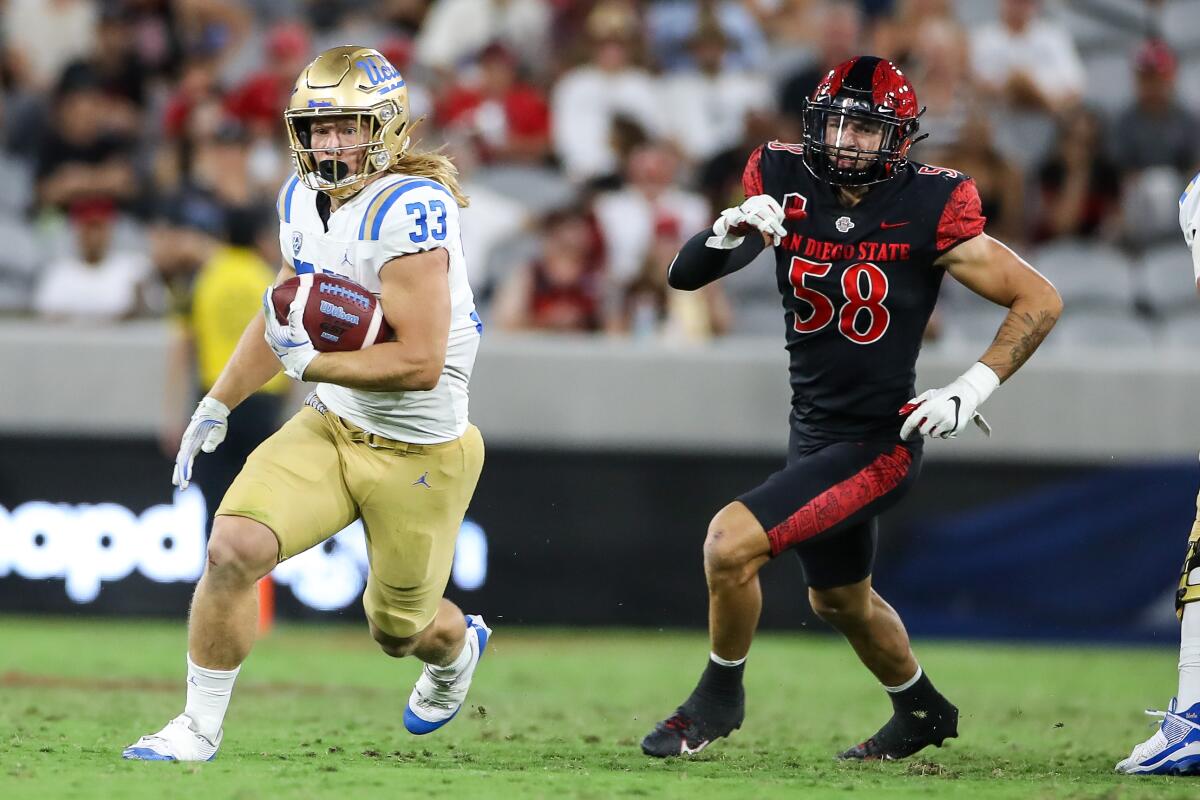 UCLA running back Carson Steele runs during a game against San Diego State.