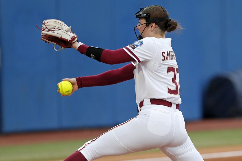 Florida State's Kathryn Sandercock pitches against Oklahoma State during the second inning of an NCAA softball Women's College World Series game Thursday, June 1, 2023, in Oklahoma City. (AP Photo/Nate Billings)