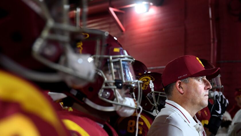 USC coach Clay Helton prepares to take his team on to the field at the Coliseum.