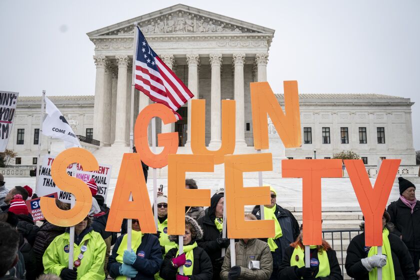 WASHINGTON, DC - DECEMBER 2: Gun safety advocates rally in front of the U.S. Supreme Court before during oral arguments in the Second Amendment case NY State Rifle & Pistol v. City of New York, NY on December 2, 2019 in Washington, DC. Several gun owners and the NRA's New York affiliate challenged New York City laws concerning handgun ownership and and they contend the city's gun license laws are overly restrictive and potentially unconstitutional. (Photo by Drew Angerer/Getty Images) ** OUTS - ELSENT, FPG, CM - OUTS * NM, PH, VA if sourced by CT, LA or MoD **