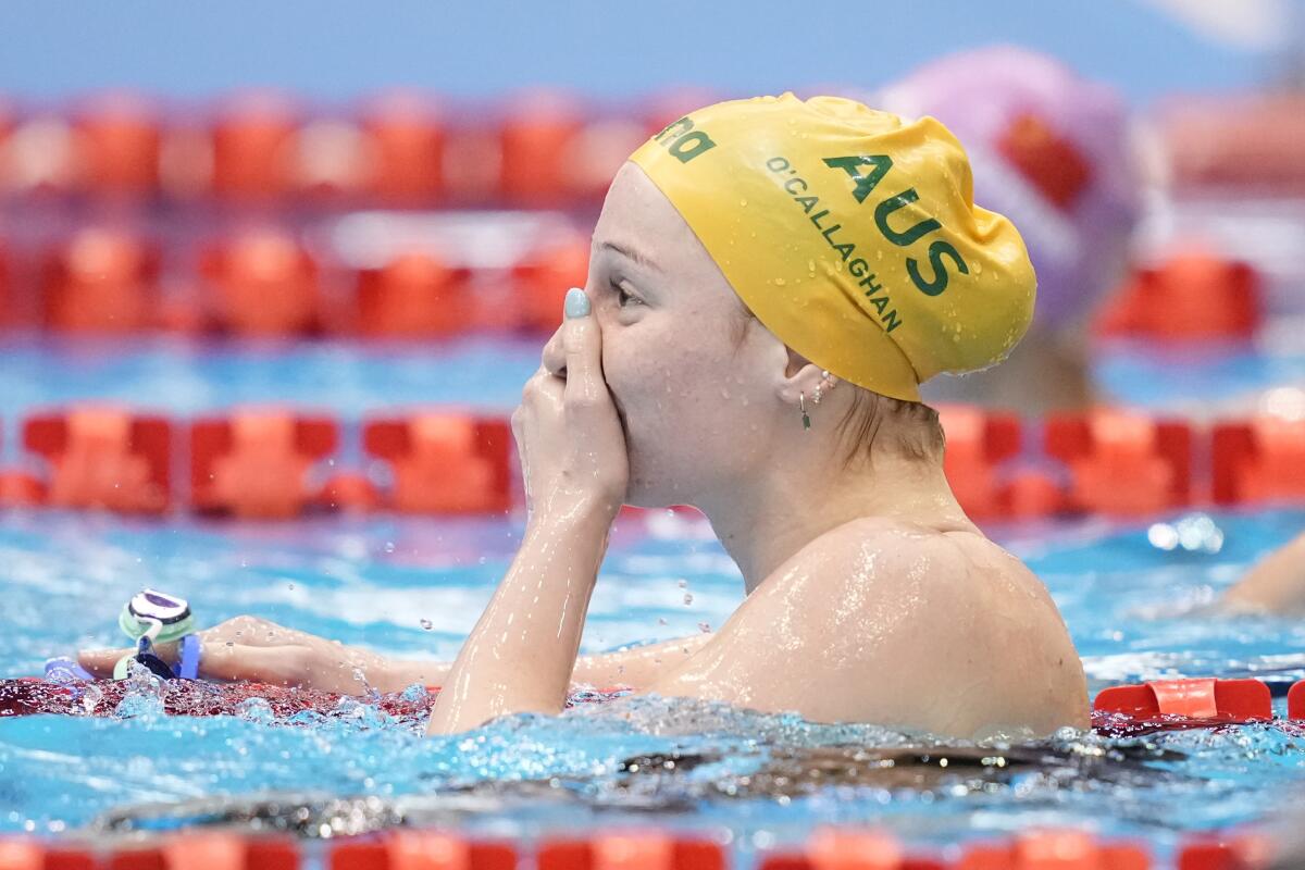 Mollie O'Callaghan overcomes injury to set new world record at swimming  world championships