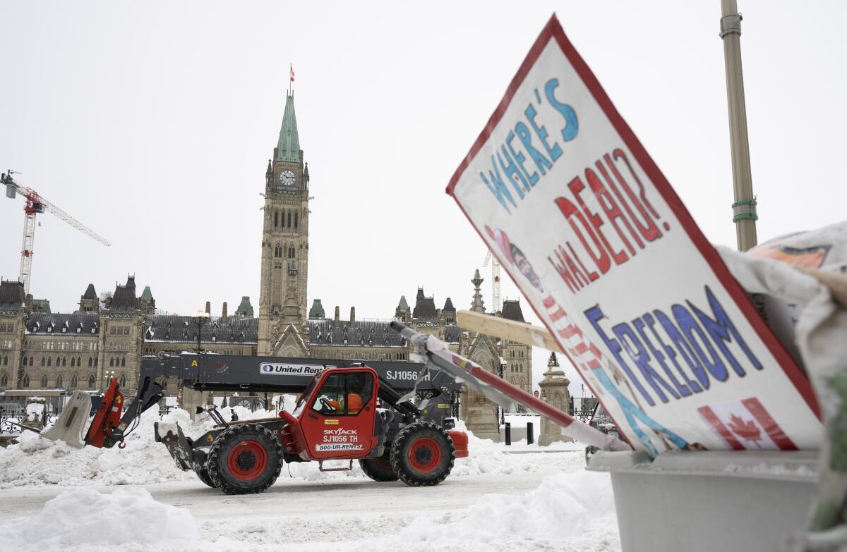 Vehicle removing a concrete barricade outside Canadian Parliament buildings