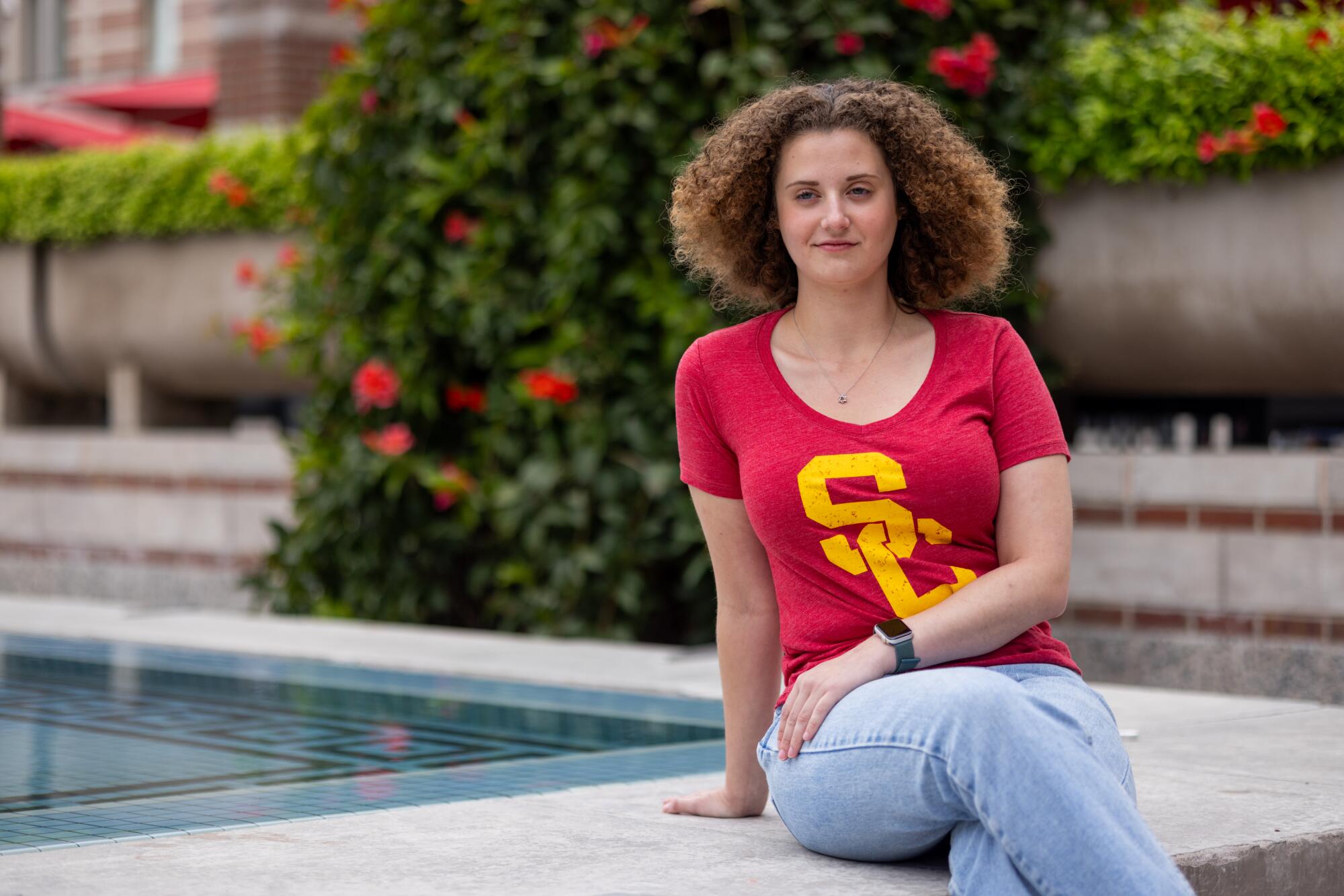 USC senior Dylan Julia Cooper sits for a portrait on campus
