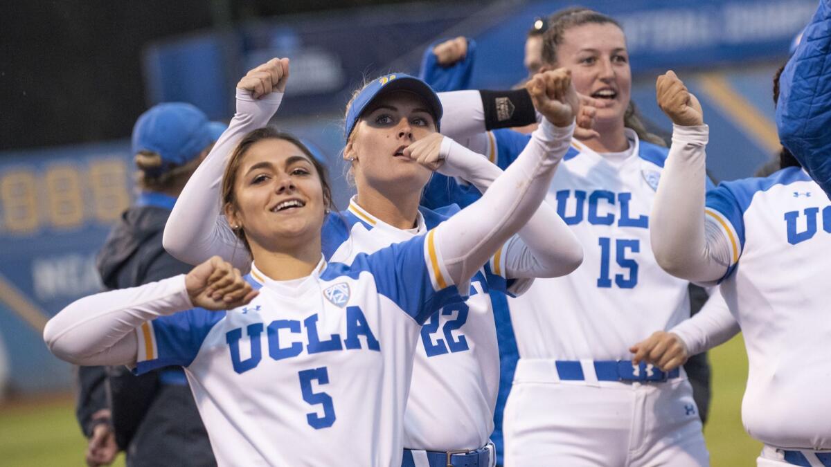 UCLA players celebrate after advancing to the NCAA Super Regionals on May 19.
