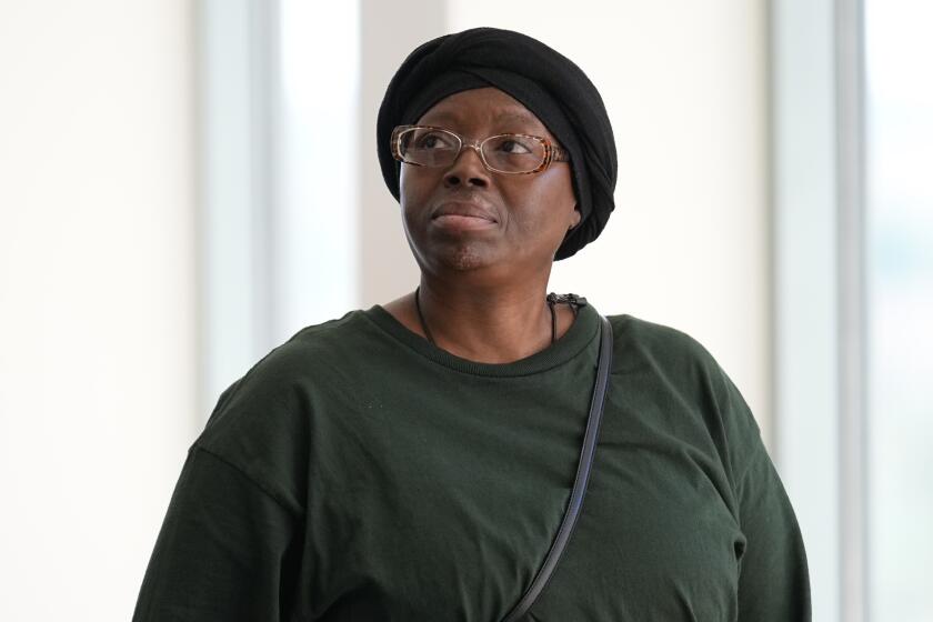 Sheneen McClain, mother of Elijah McClain, looks on outside the courtroom at the Adams County Justice Center for the start of a trial of two of the police officers charged in the death of McClain, Wednesday, Sept. 20, 2023, in Brighton Colo. (AP Photo/Jack Dempsey)