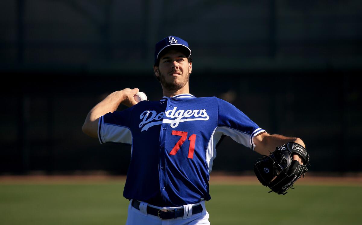 Dodger pitcher Josh Ravin, a local product from Chatsworth High, pitched a scoreless inning in the Dodgers' spring training opener.