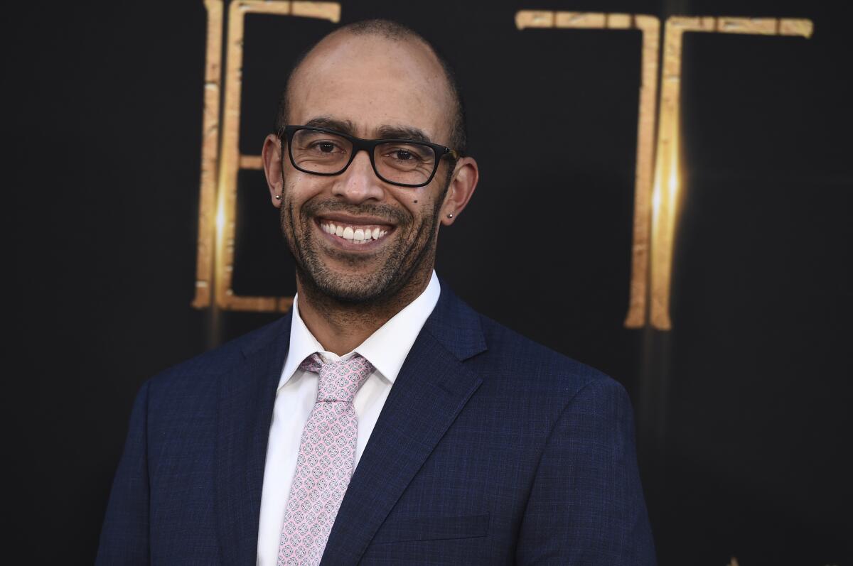 Nate Moore arrives at the premiere of "Eternals."