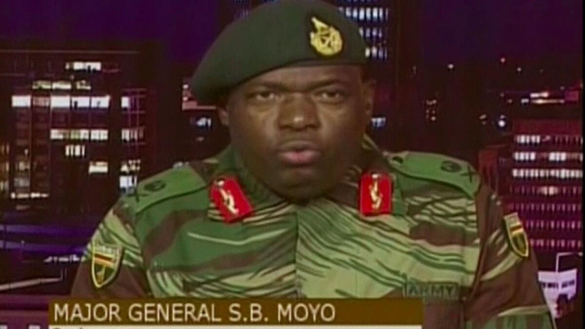 Maj. Gen. Sibusiso Moyo addresses the nation in Harare on Nov. 15.