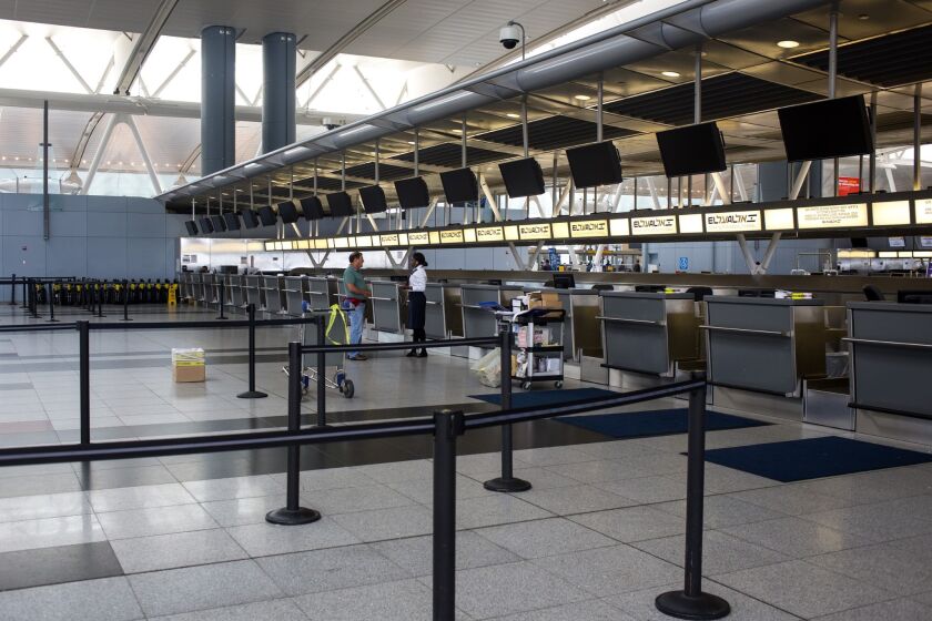 The El Al Airlines ticket desk at John F. Kennedy International Airport in New York is all but abandoned on July 22, as the FAA had barred flights to and from Tel Aviv. The restriction has now been lifted.