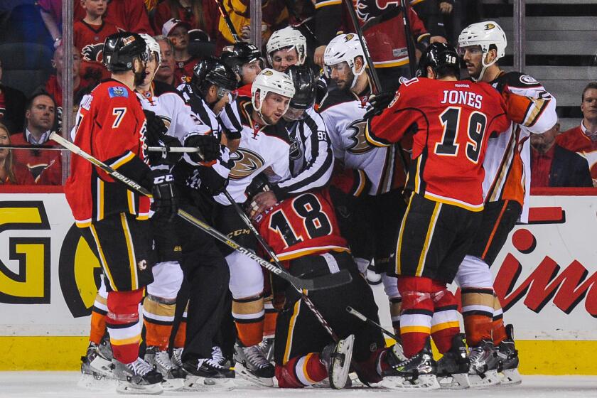 The Ducks and Flames mix it up after the whistle during Game 3 of their Western Conference semifinal playoff series.