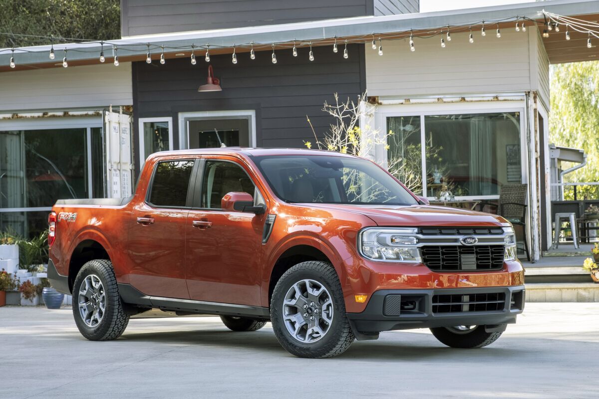 This photo provided by Ford shows the 2022 Ford Maverick, a compact pickup truck that comes standard with a hybrid engine that gets an EPA-estimated 37 mpg. (Courtesy of Ford Motor Co. via AP)