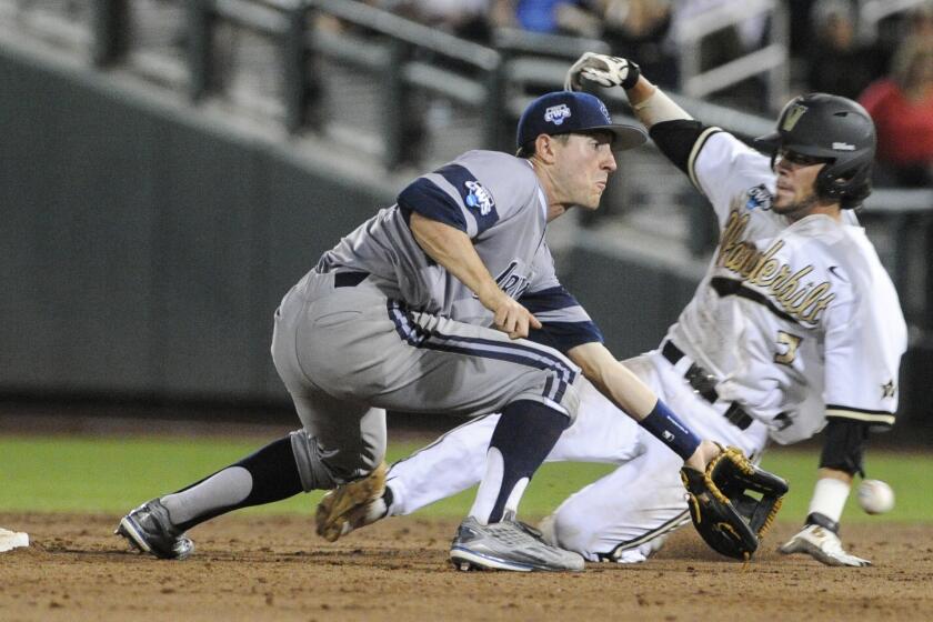 Vanderbilt's Dansby Swanson steals second base against UC Irvine's Grant Palmer during the eighth inning. Vanderbilt defeated UC Irvine, 6-4.