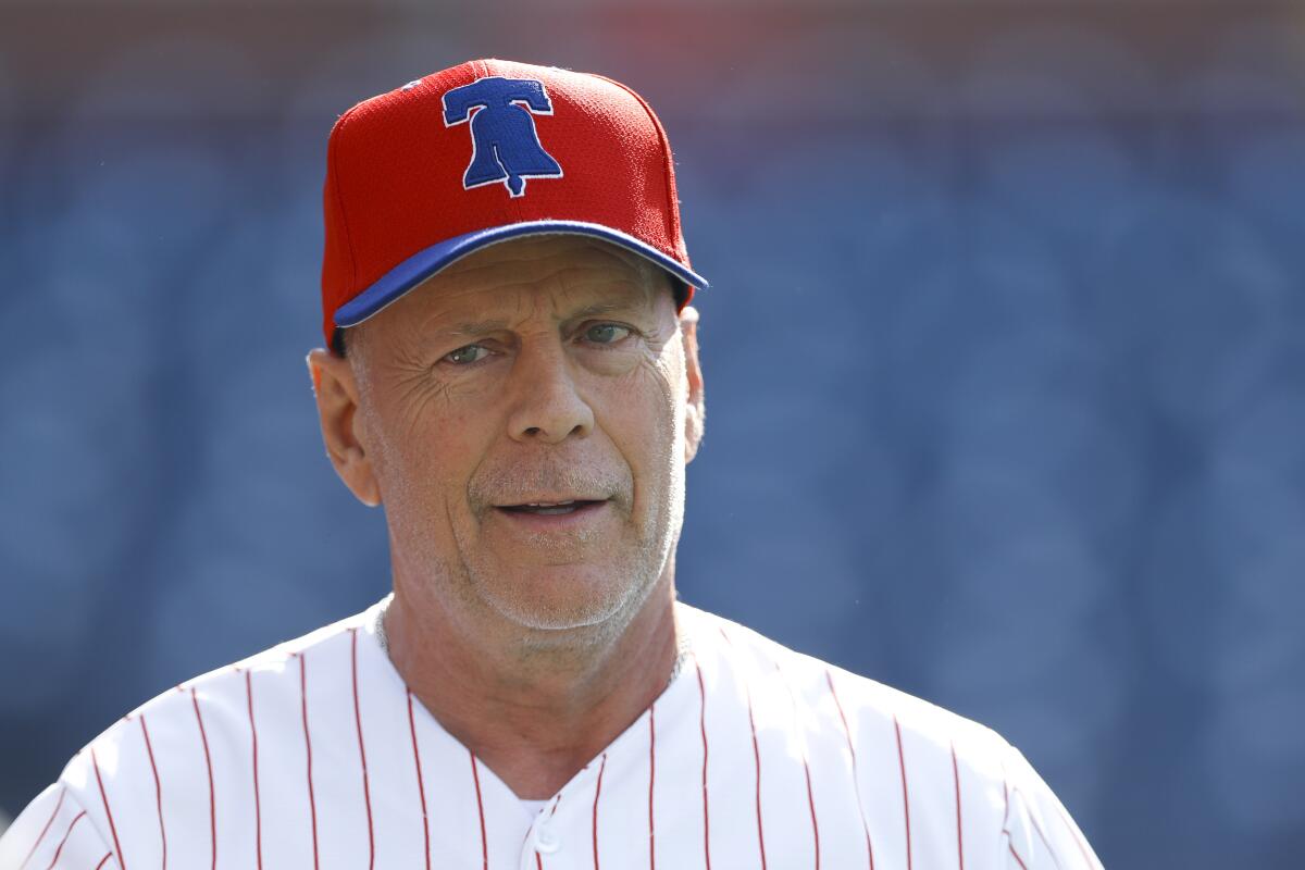Bruce Willis in a Philadelphia Phillies baseball uniform