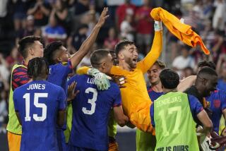 Team USA hoists their goalkeeper Matt Turner (1) in extra time in a penalty shootout during a CONCACAF Gold Cup semi-final soccer match against the Canada, Sunday, July 9, 2023, in Cincinnati. The United States advances. (AP Photo/Michael Conroy)
