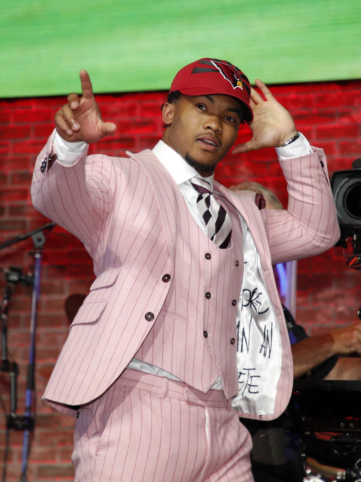 Oklahoma quarterback Kyler Murray enters the main stage after the Arizona Cardinals selected him in the first round of the NFL Draft on Thursday.
