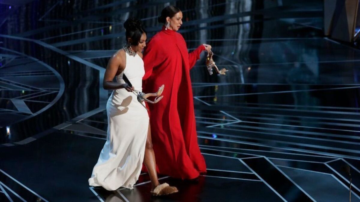 Tiffany Haddish, left, and Maya Rudolph during the telecast of the 90th Academy Awards.