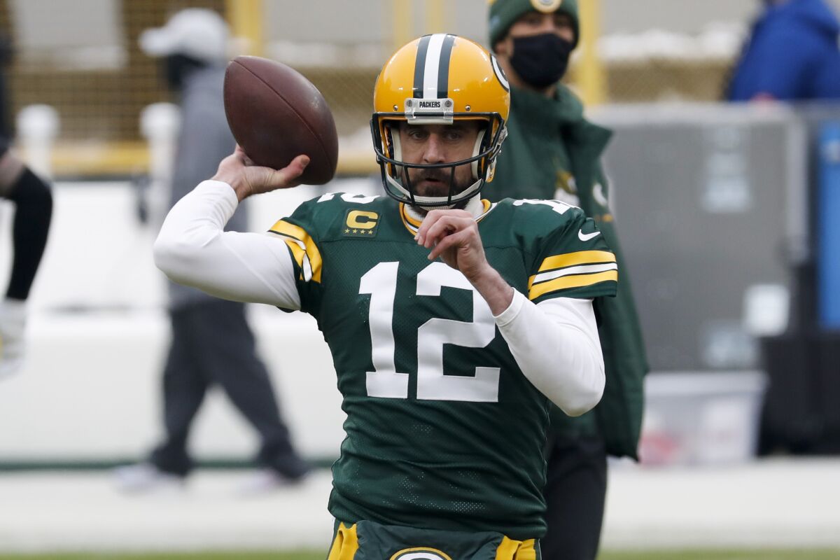 Green Bay Packers quarterback Aaron Rodgers warms up before a game.