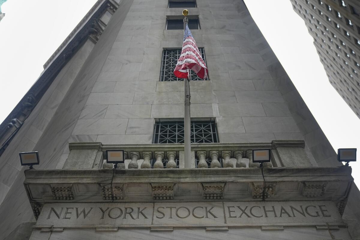 The New York Stock Exchange with a U.S. flag