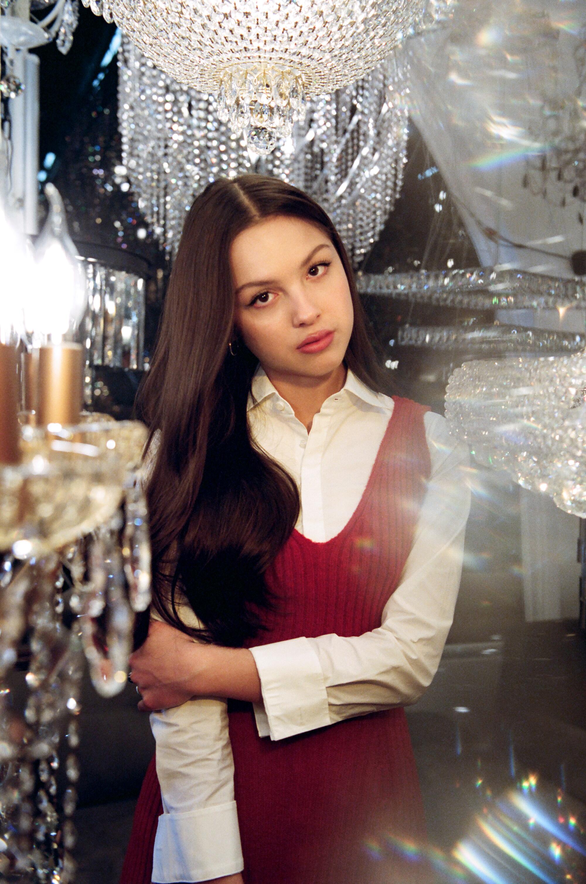 Olivia Rodrigo in a lighting store