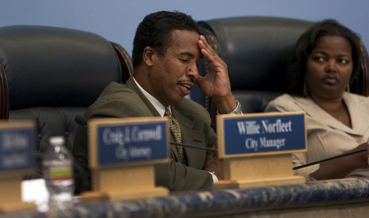 Compton Mayor Eric Perrodin tries to keep his composure as the City Council grapples with the budget four hours into a 2011 meeting. Perrodin was ousted in the city's municipal election after 12 years in office.
