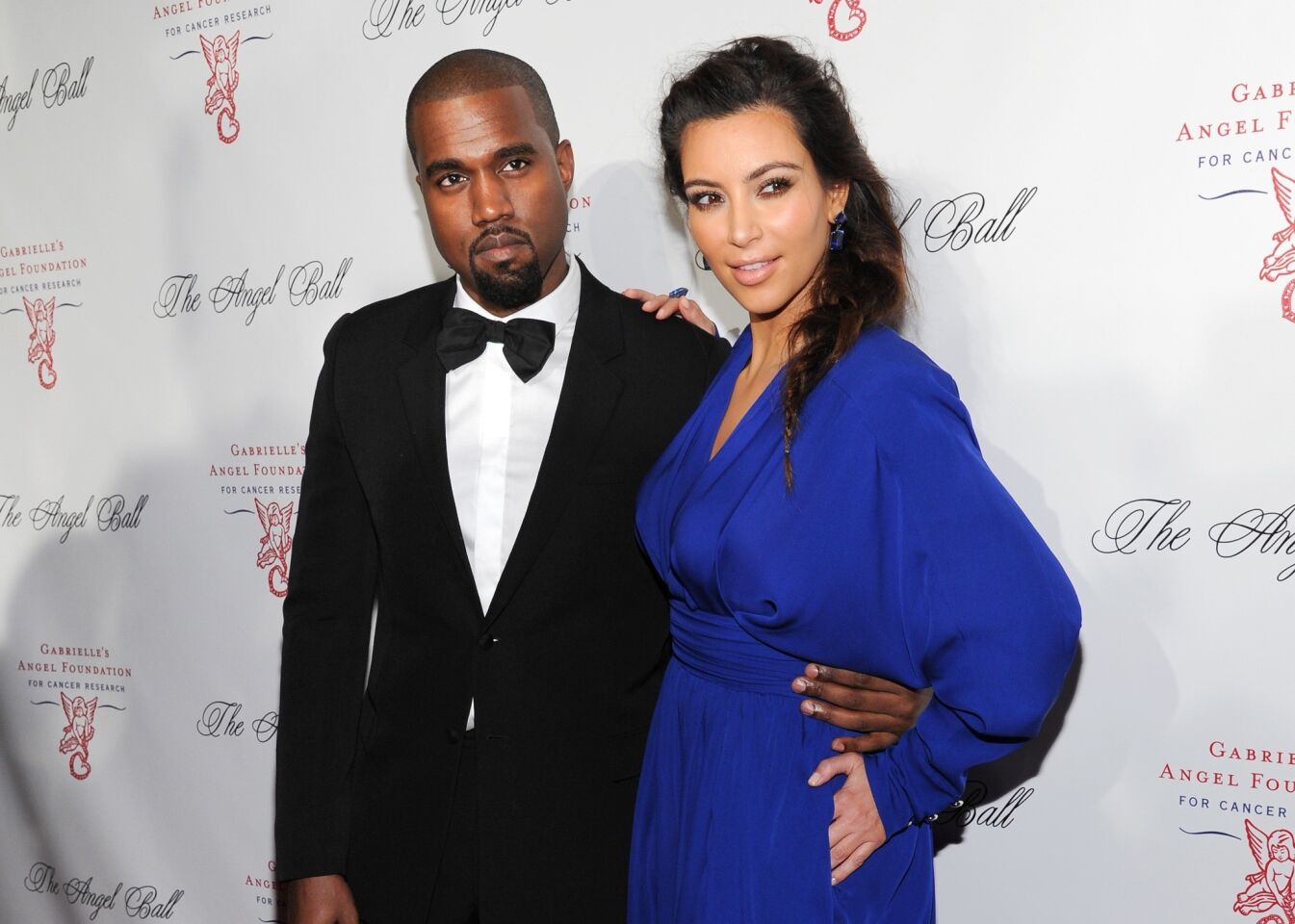 Singer Kanye West and girlfriend Kim Kardashian attend a benefit in New York.