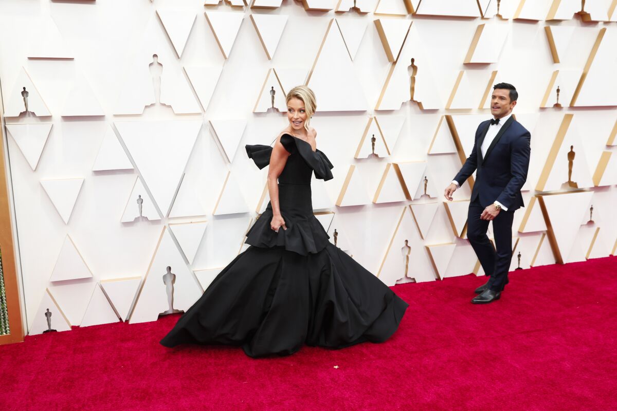 Kelly Ripa and Mark Consuelos arriving at the 92nd Academy Awards.