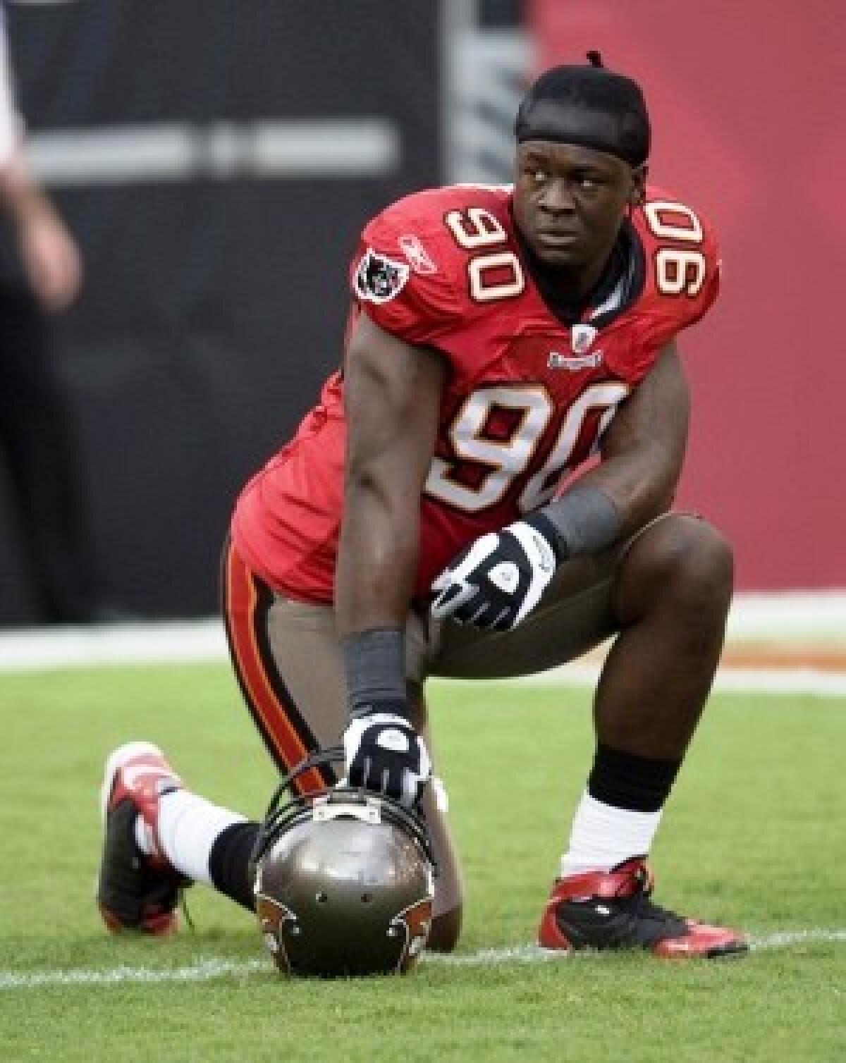 Gaines Adams went from Clemson University to the Tampa Bay Buccaneers, the fourth selection in the 2007 NFL draft. He was traded to the Chicago Bears in October.