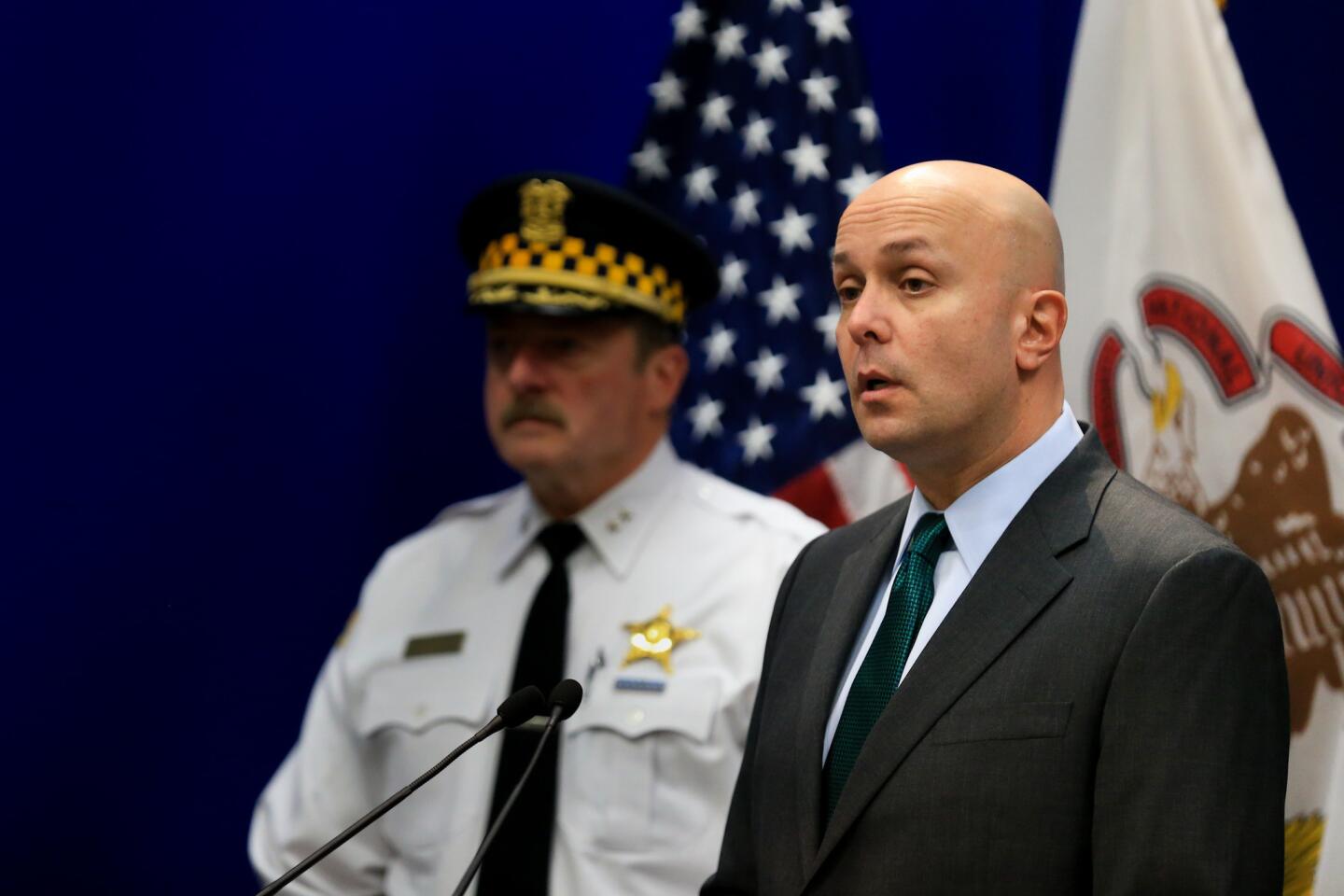 Dean Andrews, right, chief of detectives with the Chicago Police Department, speaks to the media Nov. 2, 2015, about the shooting death of Tyshawn Lee, 9, in the Gresham neighborhood.