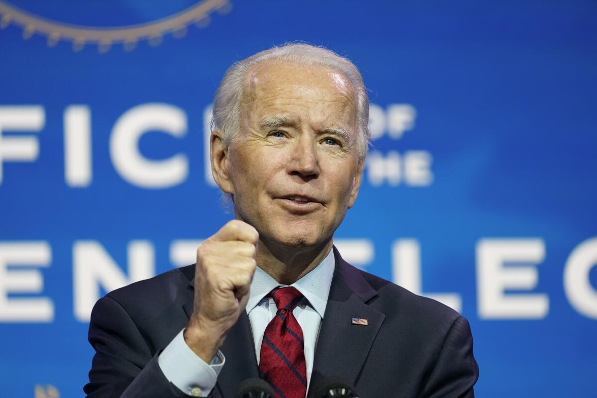 President-elect Joe Biden gestures as he speaks at the Queen theater in Wilmington, Del.