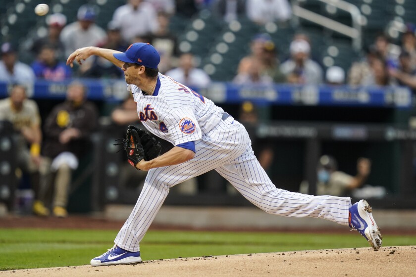 New York Mets' Jacob deGrom delivers a pitch during the first inning of a baseball game against the San Diego Padres, Friday, June 11, 2021, in New York. (AP Photo/Frank Franklin II)