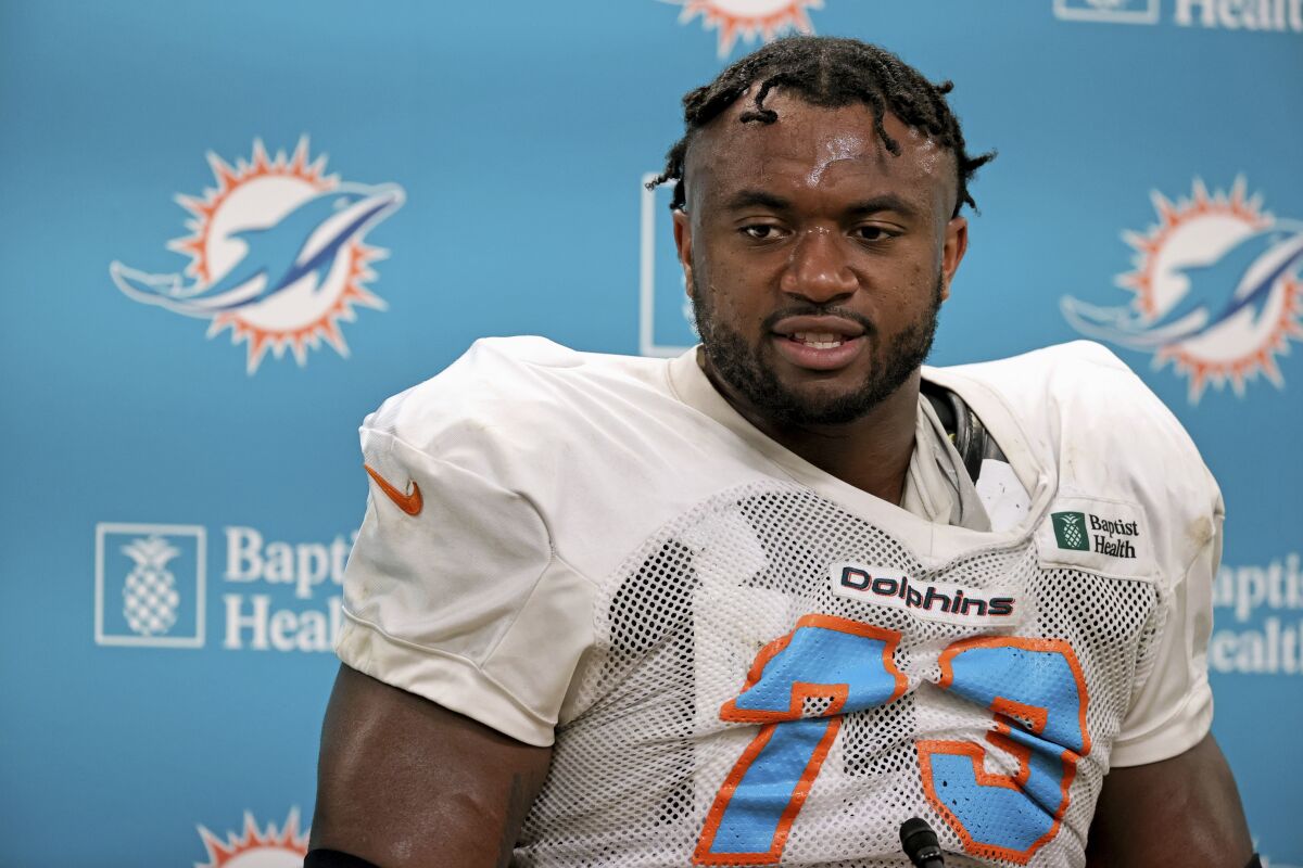 Miami Dolphins offensive tackle Austin Jackson talks with the media after NFL football practice, Wednesday, Sept. 15, 2021, in Miami Gardens, Fla. The Dolphins host the Buffalo Bills on Sunday. (David Santiago/Miami Herald via AP)