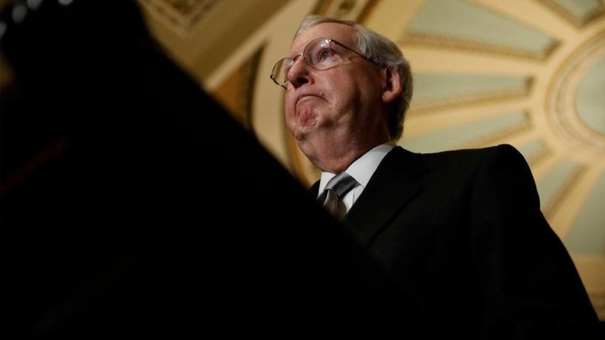 Senate Majority Leader Mitch McConnell speaks with reporters following the weekly policy luncheons at the Capitol this week.
