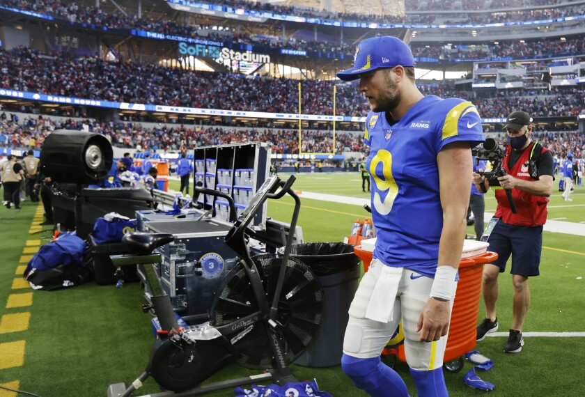 Rams quarterback Matthew Stafford (9) leaves the field after the Rams' overtime loss to the 49ers.