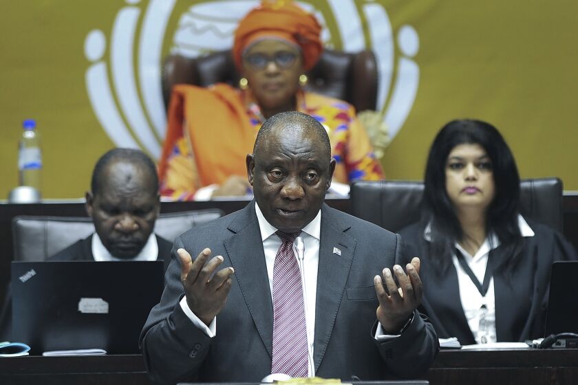 FILE - South African President Cyril Ramaphosa answers questions in parliament in Cape Town, South Africa, Thursday, May 11, 2023. Ramaphosa has appointed a judge to oversee an inquiry into allegations that the country supplied arms to Russia on a ship that docked secretly at a naval base in December. The allegations were made this month by the United States' ambassador to South Africa, who said he was sure that weapons and ammunition were loaded onto the Russian-flagged cargo ship Lady R when it docked at the Simon's Town naval base near Cape Town. (AP Photo, File)