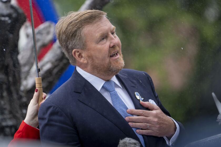 Dutch King Willem-Alexander apologized for the royal house's role in slavery and asked forgiveness in a speech greeted by cheers and whoops at an event to commemorate the anniversary of the country abolishing slavery in Amsterdam, Netherlands, Saturday, July 1, 2023. (AP Photo/Peter Dejong, Pool)