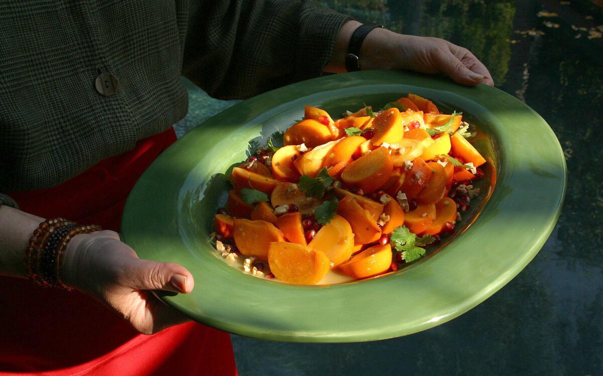 Fuyu persimmon salad with cumin-lime vinaigrette