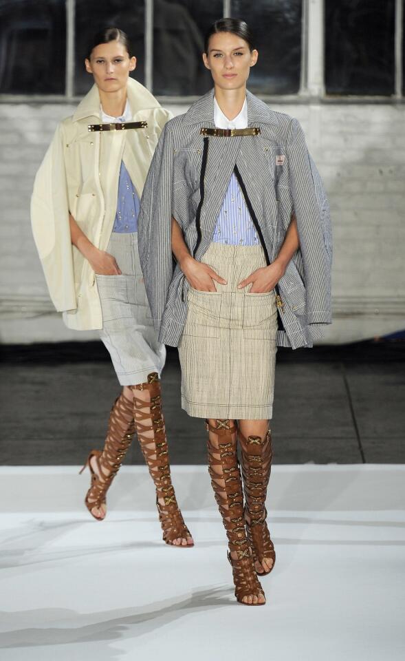 Models walk the runway at the Altuzarra spring-summer 2013 fashion show in gladiator sandal heels.