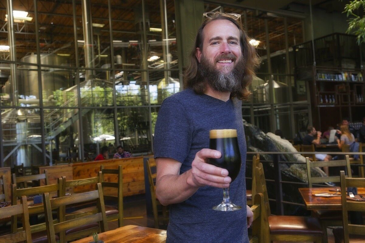 Greg Koch, Co-founder/Executive Chairman of Stone Brewing in the dining room. (Nelvin C. Cepeda/U-T)
