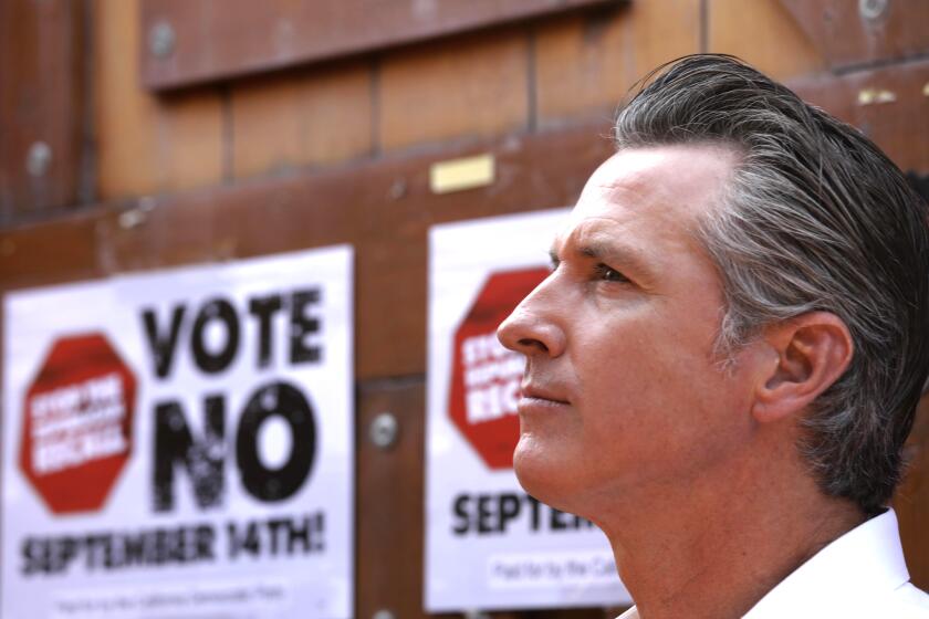 EAST LOS ANGELES, CA - AUGUST 14, 2021 - -California Gov. Gavin Newsom meets with Latino leaders to vote no on the recall at Hecho en Mexico restaurant in East Los Angeles on August 14, 2021. Governor Newsom met with volunteers who were working the phone banks calling voters to vote against the recall at the restaurant. Los Angeles City Councilman Kevin de Leon, California, California Assemblyman Miguel Santiago, California State Senator Maria Elena Durazo and other dignitaries were on hand to support the governor. (Genaro Molina / Los Angeles Times)